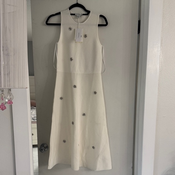 Free Assembly Dresses & Skirts - Elegant White Midi Dress with Floral Details